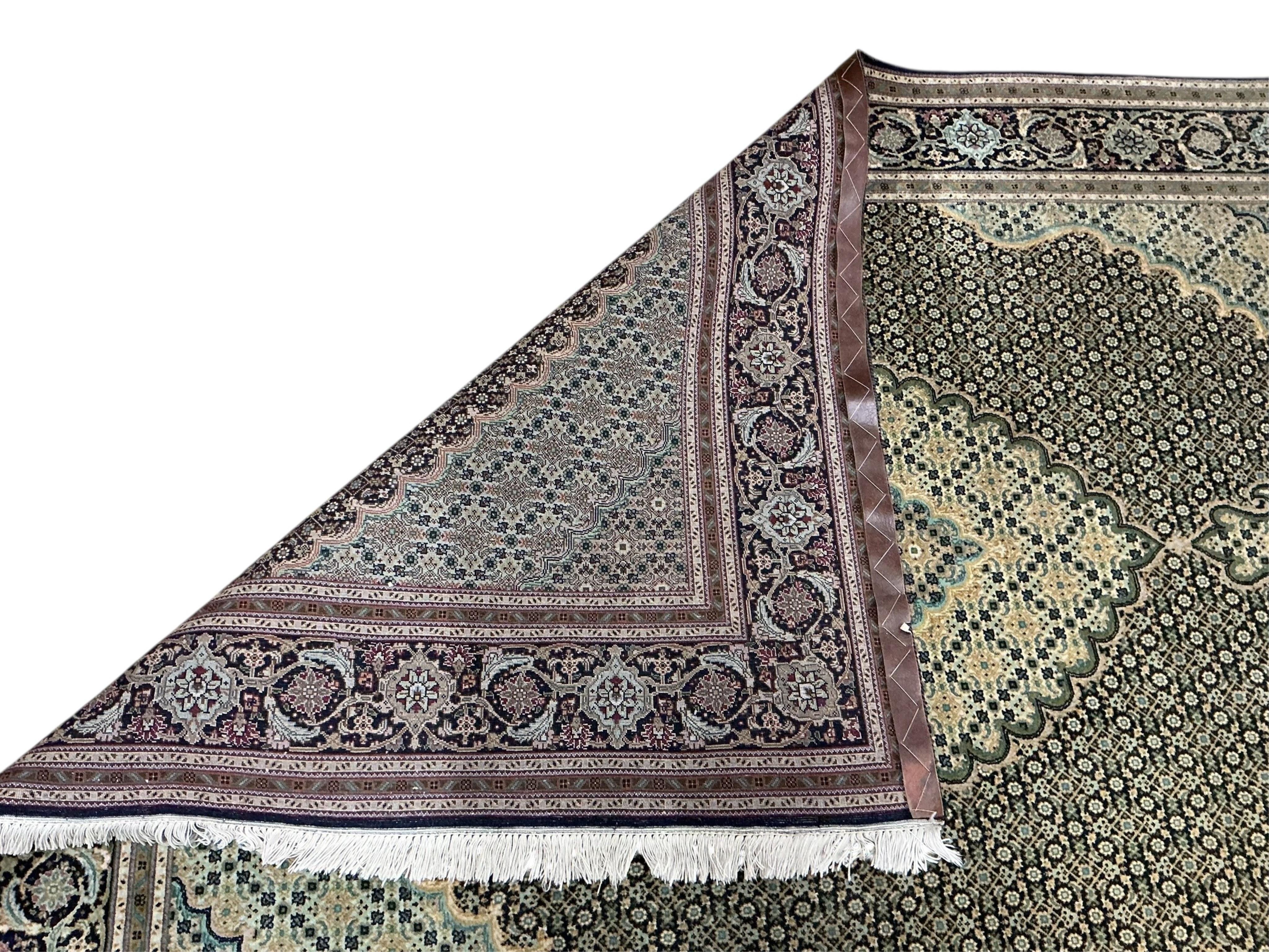 A North West Persian Shiraz blue ground rug, 208 x 153cm